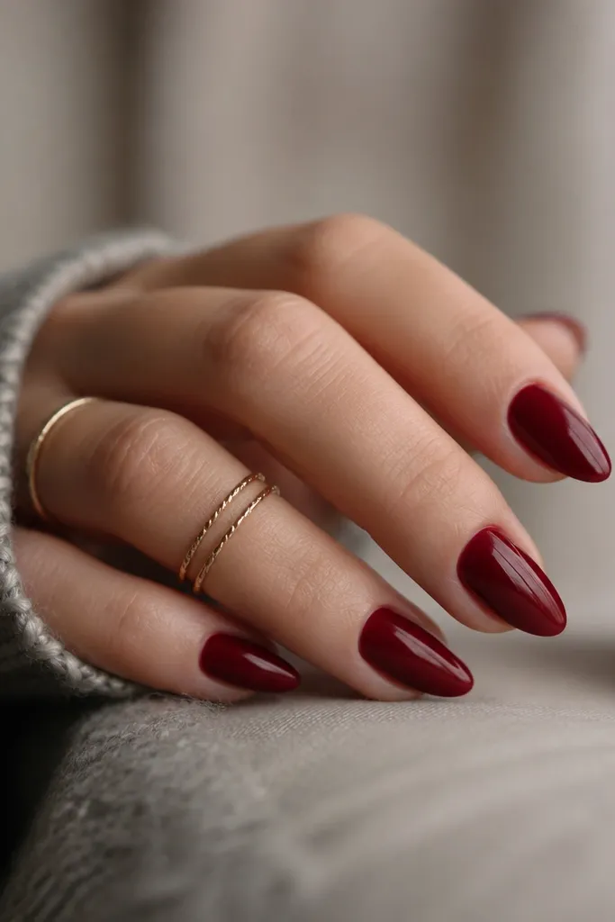 Cozy deep red almond nails