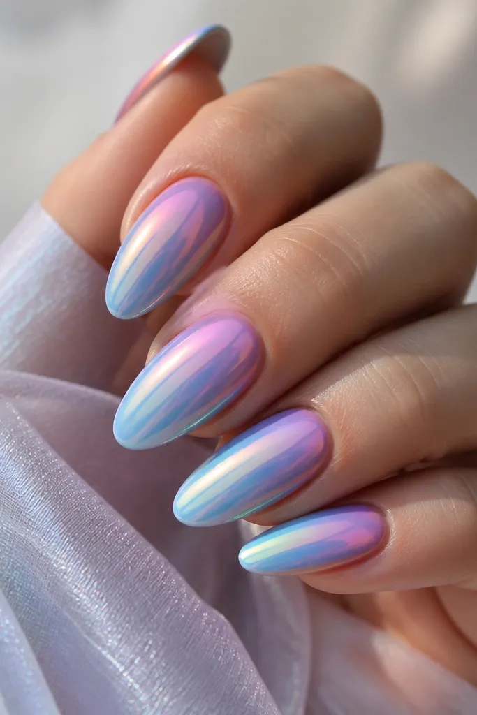A violet to blue gradient flows from cuticle to tip, covered with an iridescent chrome that flashes pink, green, and blue depending on angle.